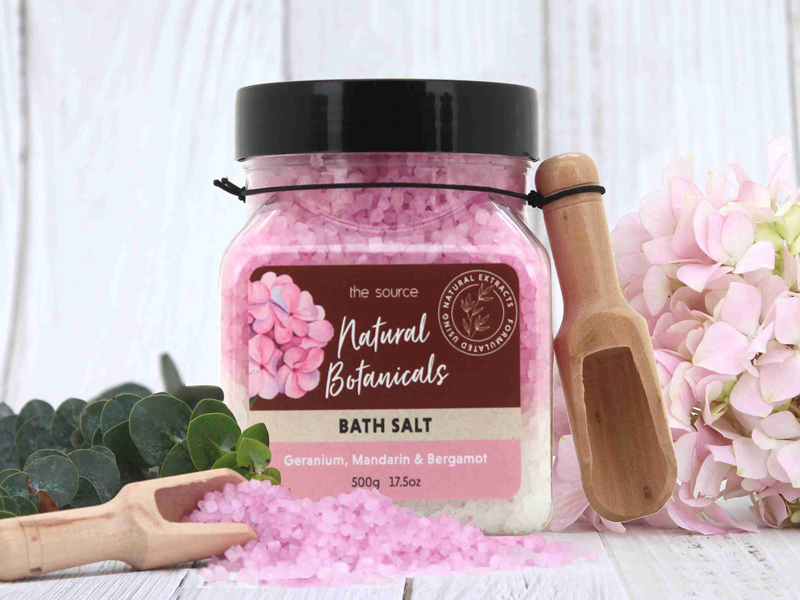 Bath Salt in plastic jar with wooden spoon